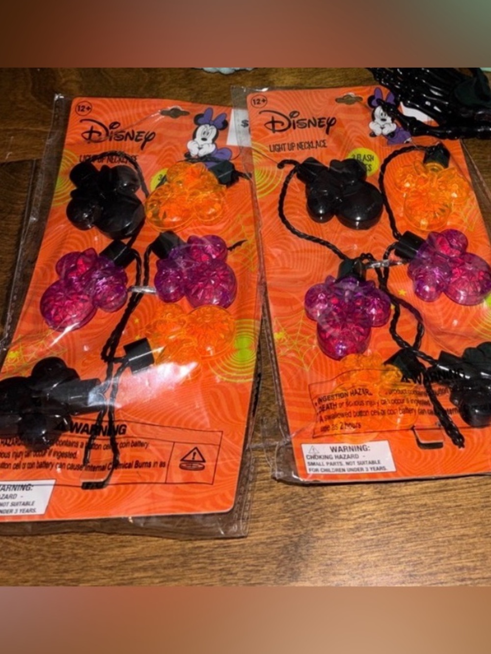 2 sets of Minnie light up necklaces